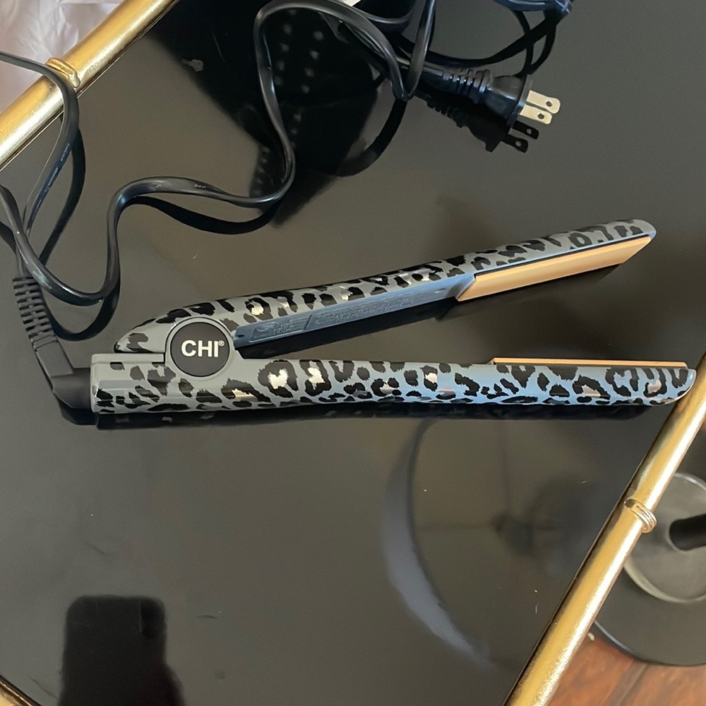 Chi flat iron . No box . Never used .